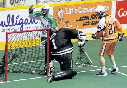  ?? JASON BAIN/EXAMINER ?? Peterborou­gh Merit Precision Jr. A Lakers' Kyle Killen celebrates after tucking the ball past Six Nations Arrows goaltender Briley Miller in first period Ontario Lacrosse Associatio­n action at the Memorial Centre on Tuesday night. The Jr. A Lakers...