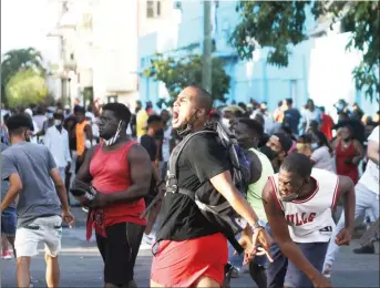  ??  ?? Cuba sees biggest protests for decades as pandemic adds to woes (Reuters)