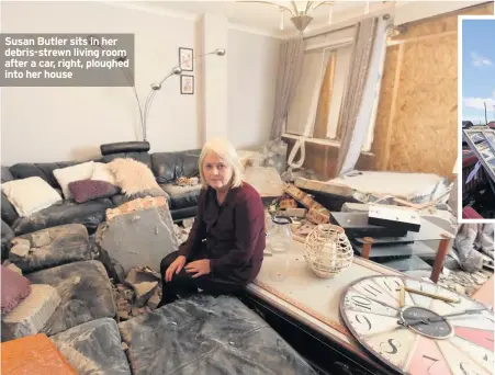  ??  ?? Susan Butler sits in her debris-strewn living room after a car, right, ploughed into her house