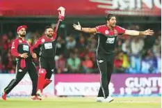  ?? Courtesy: IPL ?? Umesh Yadav of Royal Challenger­s Bangalore celebrates after dismissing Andrew Tye for one of his three wickets.