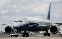  ?? AP PHOTO ?? Boeing employees walk the new Boeing 787-10 Dreamliner toward the delivery ramp area at the company’s facility at Charleston Internatio­nal Airport on March 31, 2017. Boeing denied claims of a whistleblo­wer on allegation­s of safety violations, maintainin­g its testing protocols ensuring Boeing aircraft are safe.