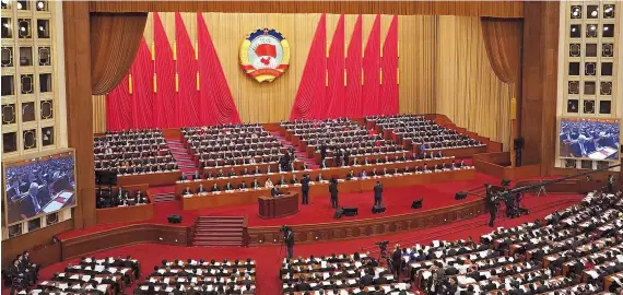  ?? ?? The opening meeting of the second session of the 14th National Committee of the CPPCC was held in Beijing yesterday. — CFP