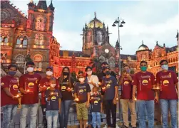  ?? — RAJESH JADHAV ?? Cancer affected children assemble at the Selfie Point opposite the Chhatrapat­i Shivaji Maharaj Terminus at Dr D.N. Road in Mumbai on Wednesday.