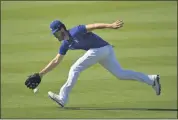  ?? MARK J. TERRILL — THE ASSOCIATED PRESS ?? Los Angeles Dodgers center fielder Cody Bellinger fields a ball during a practice session on July 3, 2020, in Los Angeles.