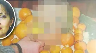  ??  ?? NIGHTMARE: A human head placed on a plate decorated with oranges