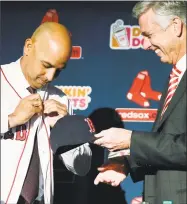  ?? Michael Dwyer / Associated Press ?? Red Sox President of Baseball Operations Dave Dombrowski, right, hopes that Alex Cora will provide an infusion of energy for Boston this upcoming season.