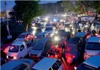  ?? APP file ?? A view of massive traffic jam at People’s Chowrangi near Mazar Quaid. —