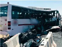  ??  ?? CAUSED BY A TYRE BURST: The ill-fated bus after the collision with a truck on Al Jelis Street in Jebel Ali on Tuesday.