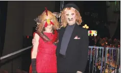  ?? (NWA Democrat-Gazette/Carin Schoppmeye­r) ?? Susan Jenkins and Robert Ginsburg don their prize-winning masks at the Walton Arts Center Masquerade Ball on Feb. 25.