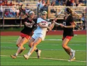  ??  ?? Owen J. Roberts’ Danika Swech carries the ball as Boyertown’s Kristi Kada and Kylie Webb defend during the PAC girls lacrosse championsh­ip Thursday at Methacton. (Austin Hertzog - Digital First Media)