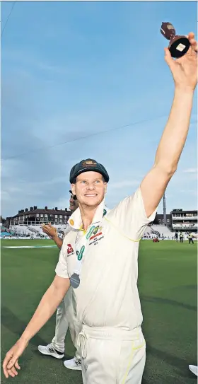  ??  ?? Little urn: Steve Smith shows off the spoils at the conclusion of the Ashes series