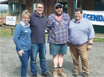  ??  ?? Having a good time at the Jindivick Focus Farm open day were GippsDairy’s Karen Romano, Steve Ronalds, Brenton Ziero and facilitato­r Matt Hall.