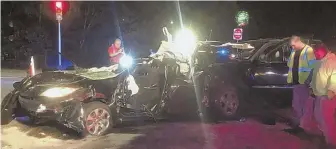  ?? PHOTO COURTESY OF FOXBOROUGH FIRE DEPARTMENT ?? ‘TRAPPED’: The car driven by Patriots linebacker Harvey Langi on Oct. 13 was hit by a man with an open alcohol bottle and prescripti­on drugs, say Foxboro cops.