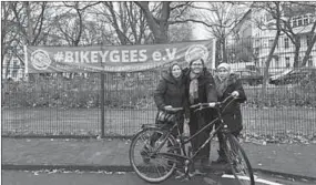  ??  ?? Annette Krüger, co-founder of Bikeygees (centre), with Rahima on the right, who wasn’t allowed to cycle before she came to Berlin. (Photo: Reuters)