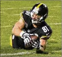  ?? DON WRIGHT /AP ?? Steelers tight end Jesse James stretches to get the ball into the end zone Sunday against the Patriots, but the play was ruled an incomplete pass.