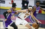  ?? RON SCHWANE — THE ASSOCIATED PRESS ?? JaVale McGee vies for the ball between the Kings’ Richaun Holmes (22) and Harrison Barnes (40) on March 22.