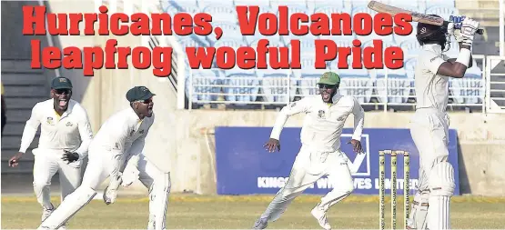  ?? IAN ALLEN/PHOTOGRAPH­ER ?? Alick Athanaze (right) of the Windward Islands Volcanoes is caught behind by Jamaica Scorpions wicketkeep­er Aldane Thomas (second left) on the second day of the Regional Four-Day match at Sabina Park last weekend. Also in action are Paul Palmer Jr (left) and Jermaine Blackwood.