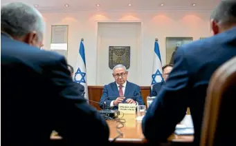  ?? AP ?? Israeli Prime Minister Benjamin Netanyahu, centre, attends the weekly cabinet meeting at the Prime Minister’s office in Jerusalem yesterday.