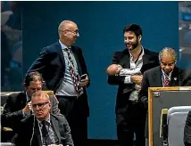  ?? AP ?? Jacinda Ardern’s partner, Clarke Gayford, holds their baby, Neve, during Ardern’s speech in New York.