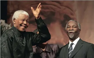  ??  ?? LEADERS: Thabo Mbeki and Nelson Mandela left different legacies, which a democratic South Africa finds itself navigating through.