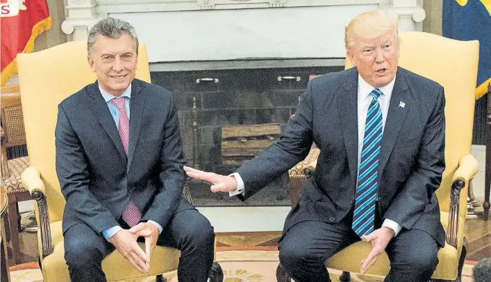  ?? AFP ?? Viejos conocidos. Los presidente­s Mauricio Macri y Donald Trump, en abril del año pasado, durante un encuentro bilateral que mantuviero­n en la Casa Blanca.