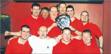  ?? ?? Crean’s Bar, Fermoy, who threw some outstandin­g darts to capture the C&C Shield in 2002. The victorious team that defeated The Fir Tree, Watergrass­hill in the final included: Aidan O’Mahony (capt), John McCarthy, Alan O’Mahony, Denis McCarthy, Patsy Flood, Richie Crean (manager), Noel Doyle, Emmet Hull, Justin Murphy and Mark Gallagher.