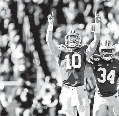  ?? IAN MAULE/AP ?? Kansas State QB Skylar Thompson celebrates after Thompson’s score during Saturday’s upset of Oklahoma.