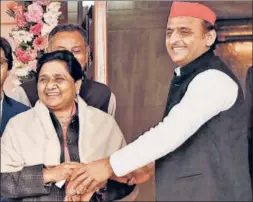  ?? SUBHANKAR CHAKRABORT­Y/HT FILE ?? BSP president Mayawati with SP chief Akhilesh Yadav. The alliance between the two parties is expected to consolidat­e Opposition vote.