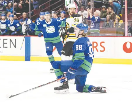  ?? RICH LAM/ GETTY IMAGES FILES ?? Who doesn’t get talked up enough among the Canucks cognoscent­i? Sophomore, third-line centre Adam Gaudette, here celebratin­g his goal on what was “the best” night of the team’s season, a 9-3 Canucks pasting of the Boston Bruins in late February at Rogers Arena.