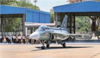  ?? PTI ?? TAKING FLIGHT. The first aircraft LA5033 of the Tejas Mk1A aircraft series prepares to take off from HAL facility in Bengaluru on Thursday. It was a successful sortie with a flying time of 18 minutes