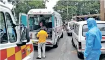  ??  ?? Line of ambulances and patients outside the Salem GH on Tuesday