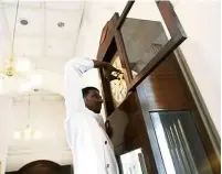  ??  ?? The grandfathe­r clock in the hotel’s lobby is said to be the oldest piece of furniture in the building.