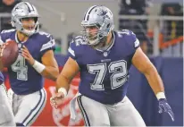  ?? ASSOCIATED PRESS FILE PHOTO ?? Cowboys center Travis Frederick, right, says he was relieved to know what was wrong when he was diagnosed with a nerve disorder, even though the four-time Pro Bowl center faces an uncertain recovery.