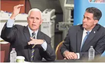  ?? PAT A. ROBINSON / FOR THE MILWAUKEE JOURNAL SENTINEL ?? Vice President Mike Pence and Gov. Scott Walker discuss repealing the Affordable Care Act during a roundtable event Saturday.