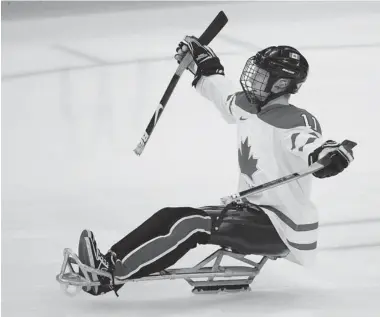  ?? JASON PAYNE/ POSTMEDIA NEWS ?? Sledge hockey player Adam Dixon will be playing for Team Canada at the Paralympic­s. Action begins on Saturday in Sochi.