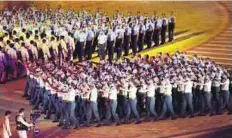  ??  ?? Celebratio­ns were begun by performers recreating a traditiona­l desert setting which involved the building of a dhow. The ceremony included a march-past by soldiers.