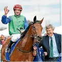  ?? GETTY IMAGES ?? Part-owner John Rattray leads Bonneval back to scale following her Underwood Stakes victory.