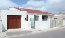  ??  ?? The three-bedroom home in Rocklands, Mitchells Plain, to be auctioned by Rawson on April 28.