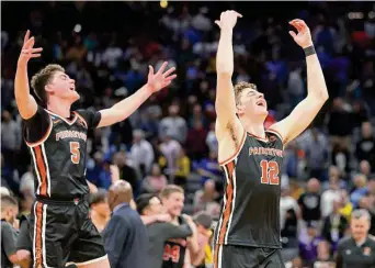  ?? Ezra Shaw/Getty Images ?? Princeton’s Jack Scott, left, and Caden Pierce celebrate after the Tigers’ second-round victory over Missouri on Saturday. It’s the third straight year a 15-seed has advanced to the Sweet 16.