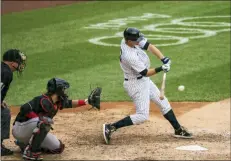  ?? COREY SIPKIN - THE ASSOCIATED PRESS ?? New York Yankees’ DJ LeMahieu hits a two-run double during the sixth inning of a baseball game against the Miami Marlins at Yankee Stadium, Saturday, Sept. 26, 2020, in New York.