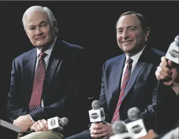  ?? ASSOCIATED PRESS ?? IN THIS JAN. 24, 2015, FILE PHOTO, NHL Player’s Associatio­n executive director Donald Fehr, left, and NHL Commission­er Gary Bettman attend a news conference at Nationwide Arena in Columbus, Ohio.