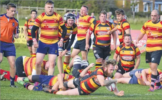  ?? Picture: Paul Amos FM4543698 ?? Charlie Coleman of Ashford 2nds goes over for one of his two tries during their win over Medway 2nds