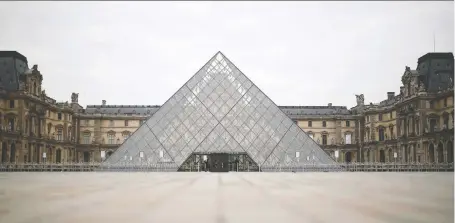  ?? CHRISTIAN HARTMANN/REUTERS ?? You can’t visit the Louvre in person right now, but you can go on a virtual tour of it.