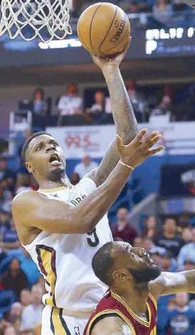  ?? AP ?? New Orleans Pelicans forward Terrence Jones shoots over Cleveland Cavaliers forward LeBron James during the second half of their game in New Orleans.