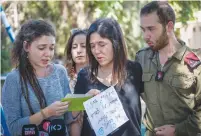  ?? (Flash90; Courtesy) ?? FAMILY MEMBERS of Michal Sela (top right) speak with the press near their home in Beit Zayit on Friday.