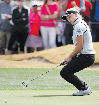  ?? CHRISTIAN PETERSEN/GETTY IMAGES ?? Canada’s Brooke Henderson failed to make the cut at the Bank of Hope Founders Cup in Phoenix by one shot after firing a second straight 72 on Friday. Cydney Clanton leads at minus-9.