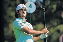  ??  ?? Abraham Ancer watches his tee shot on the fourth hole during the second round Friday in Augusta, Ga. [AP PHOTO/CHRIS CARLSON]