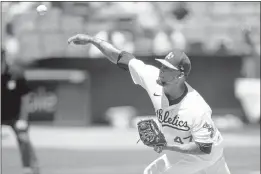  ?? TONY AVELAR — THE ASSOCIATED PRESS ?? A’s starting pitcher Frankie Montas throws against the Rays during the first inning of a on Saturday in Oakland.