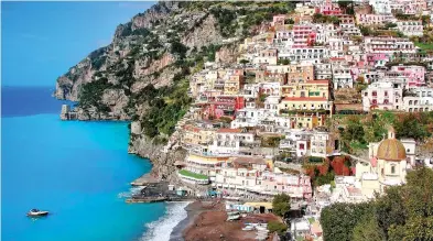  ??  ?? Breathtaki­ng: The village of Positano, on southern Italy’s famous Amalfi Coast
