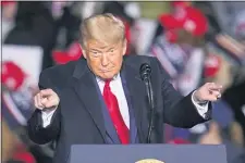  ?? GENE J. PUSKAR - THE ASSOCIATED PRESS ?? President Donald Trump speaks during a campaign rally at Erie Internatio­nal Airport Tom Ridge Field in Erie, Pa, Tuesday, Oct. 20.